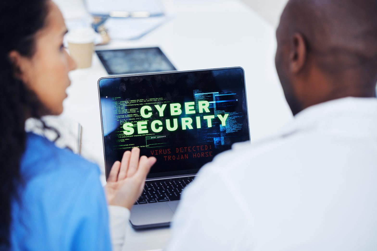 woman and man talking about cyber security