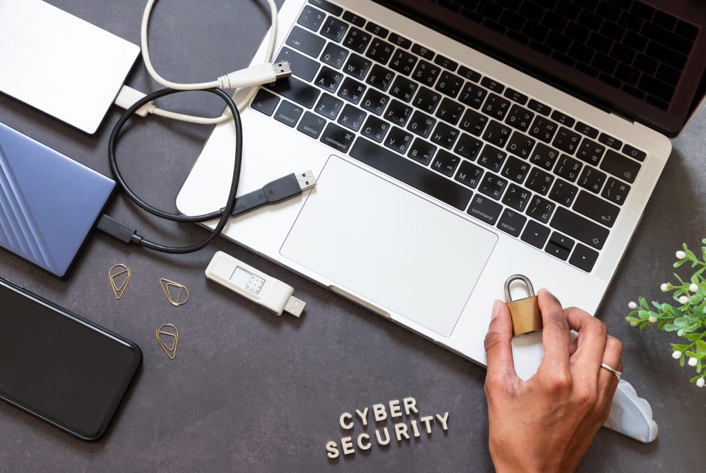 laptop and a small lock